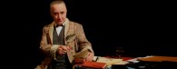 The first time I saw Roger Llewellyn’s sublime one man performance as the near unbalanced and eccentric consulting detective Sherlock Holmes was in 2001. ‘The Last Act’ was set after Watson’s funeral in the backdrop of  World War One. Holmes is sat alone in Baker Street, everything he once knew and held dear in the world has changed around him. He feels out of place in the world, out of touch and out of time. He reminisces of old adventures with his loyal companion, confessing past sins, and finally reveals the painful truths to his departed friend about his youth and upbringing around an alcoholic and violent father. I enjoyed Robert Llewellyn’s portrayal of Sherlock Holmes so much that I went to see him again the following year. I have come to look at Roger Llewellyn as a definitive performer of Sherlock Holmes in modern times, second only to Jeremy Brett. 2009 saw a new production of Sherlock Holmes being toured around the UK.  ‘Sherlock Holmes…The Death and Life’ combines the worlds of fiction and reality as we shift between Doyle’s inner psyche and Sherlock Holmes’ fictional world of 19th century London. Doyle has grown tired of being referred to...